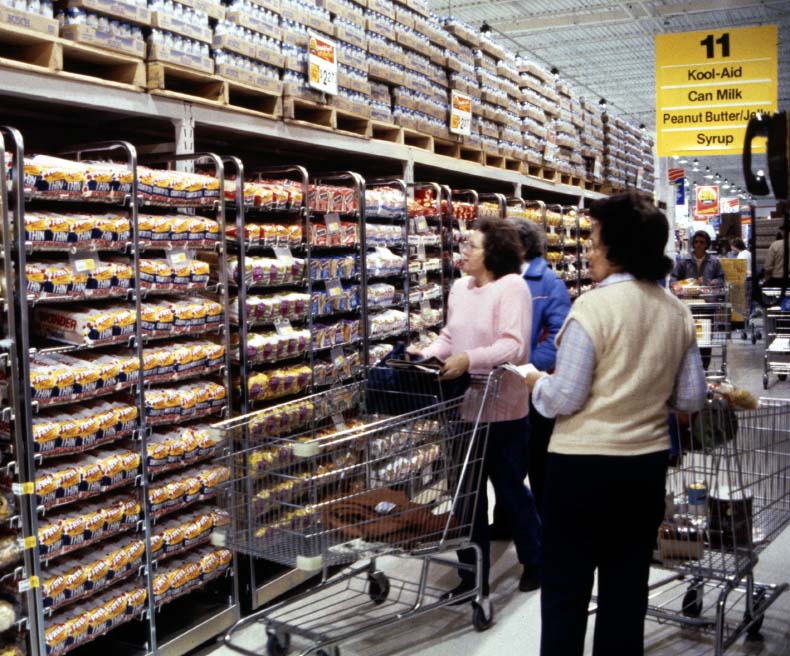 Customers at a Walmart shop bread options at their local store